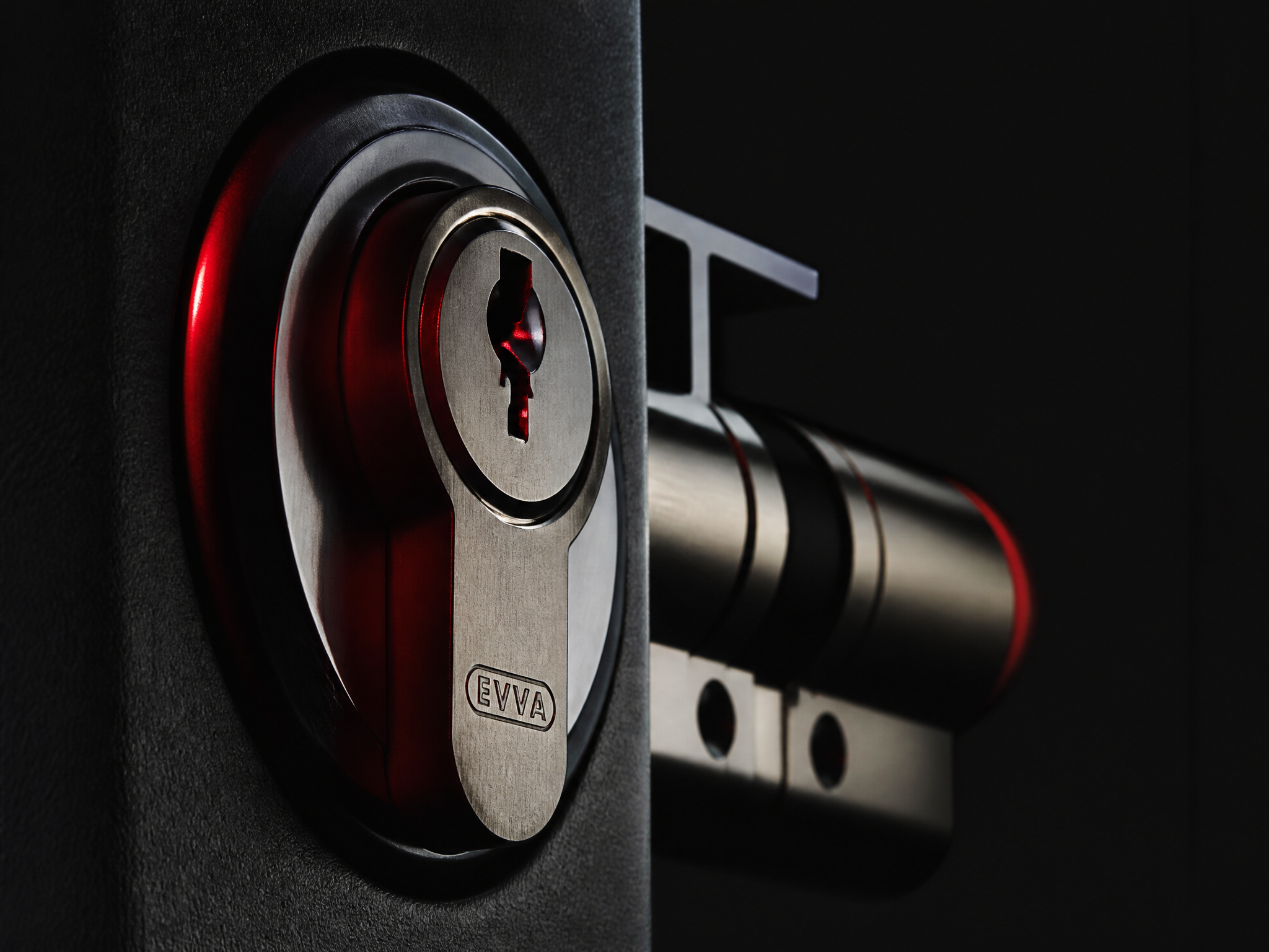 Close-up of a high-security euro-cylinder door lock fitted to a modern door